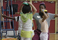 Girl jumping through hoops