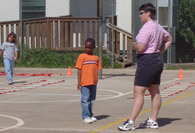 Student and teacher on court