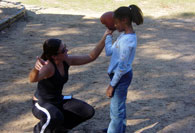 Girl throwing football