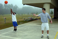 Intern directing students on court