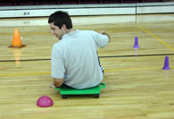 Intern riding on scooter