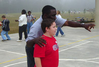 Student intern pointing out area to student