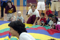Students around parachute