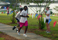 Students running on sidewalk