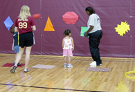 Students throwing at targets